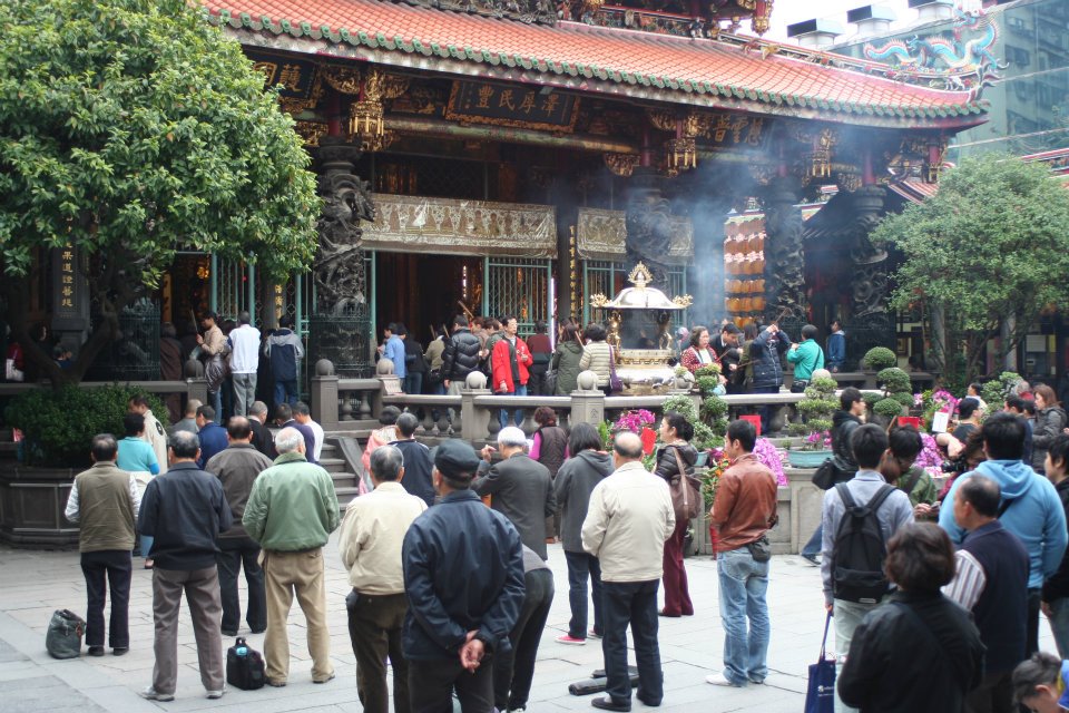People come to the temple to pray and celebrate the new year.